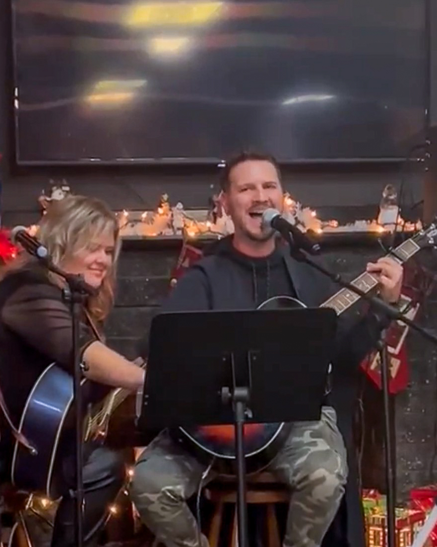 Brad and Cristy performing a live acoustic set