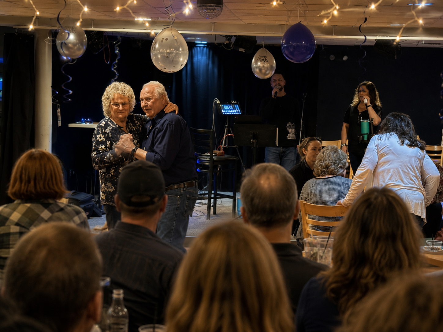 North Country Duo performing live as the crowd dances